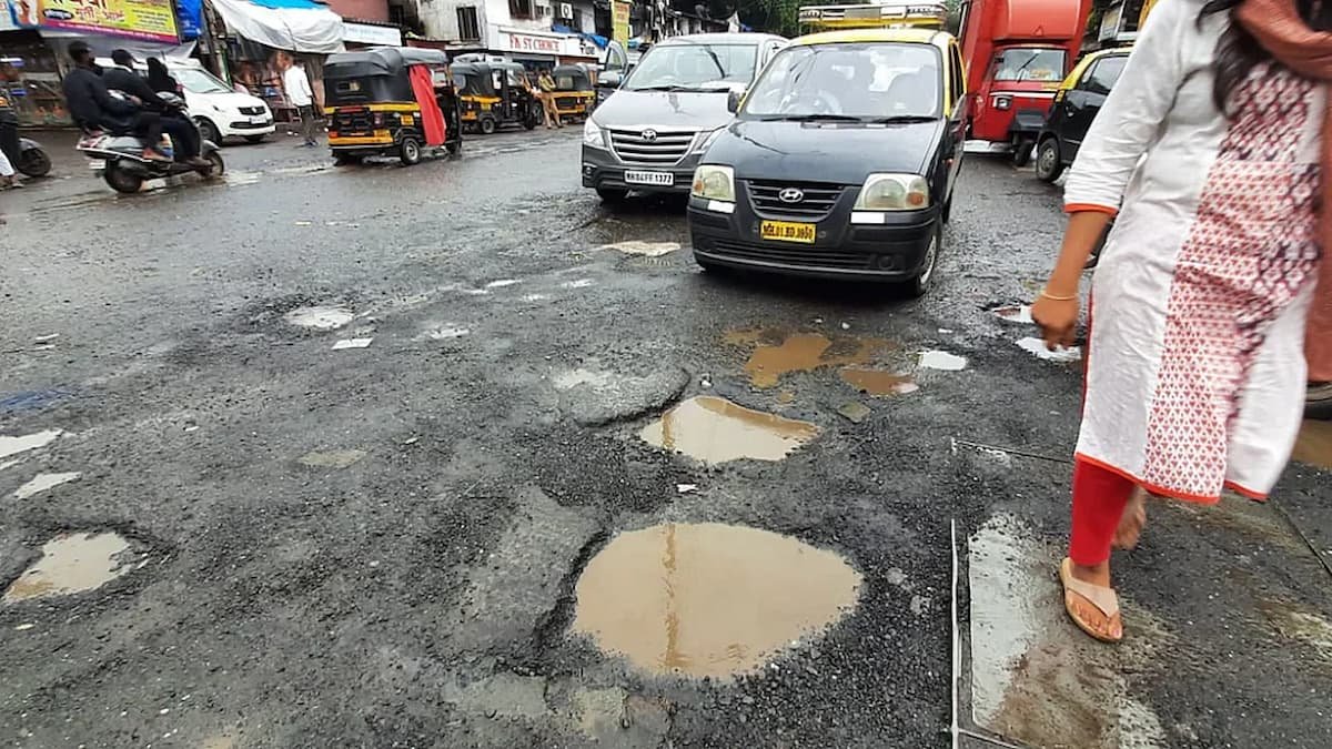 mumbai rains, monsoon, potholes, mumbai potholes, rains